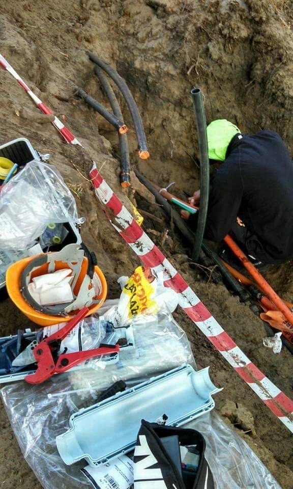 Telecom engineers repairing fibre infrastructure in Nigeria