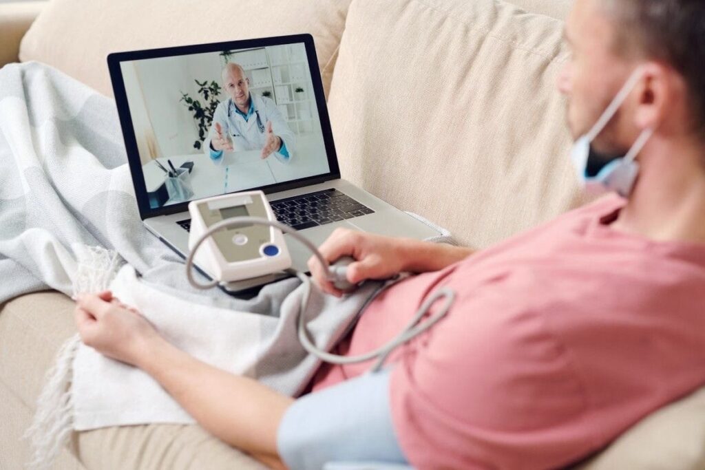 Family accessing healthcare remotely using telemedicine in Nigeria.