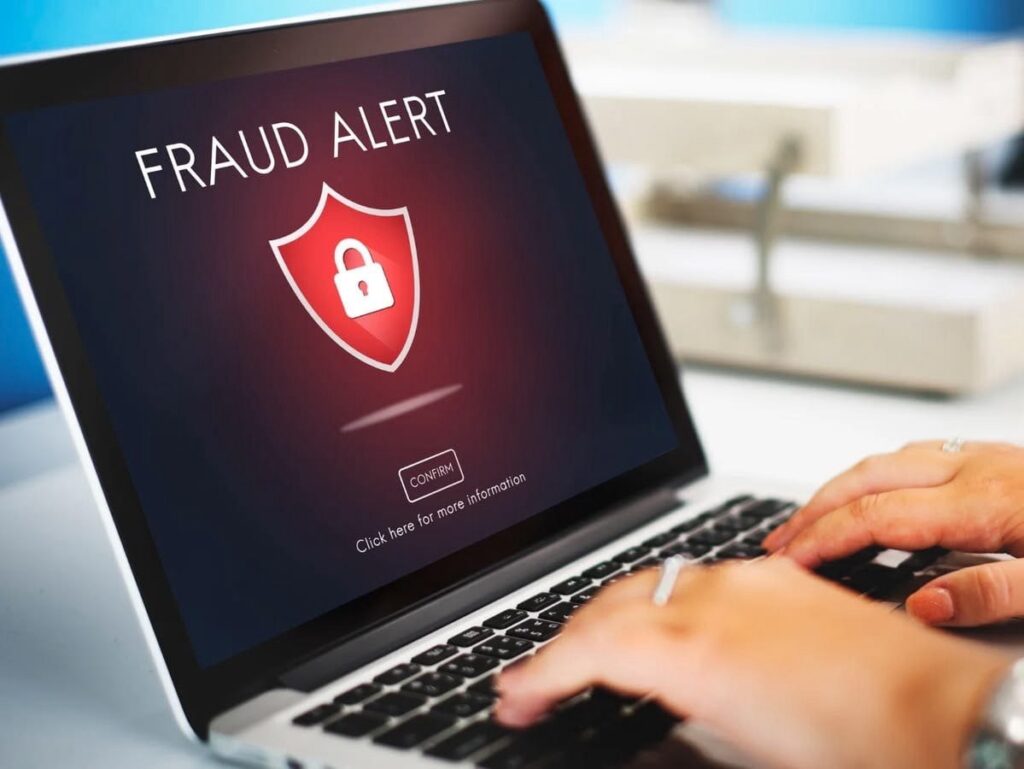 Keyboard highlighting online fraud and cybersecurity threats affecting digital payments.