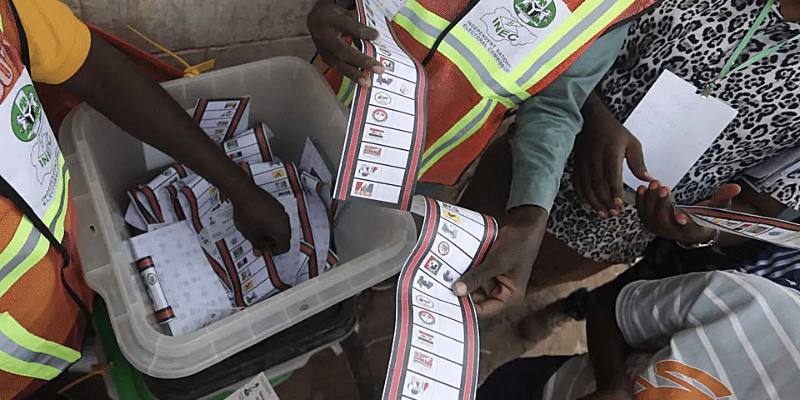 INEC officials preparing voter registration materials during Nigeria's continuous voter registration exercise.