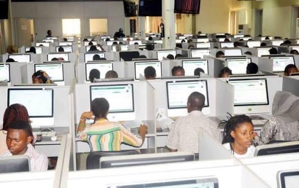 Students taking a computer-based test at a Nigerian CBT centre