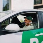 Bolt driver picking up a passenger in Nigeria