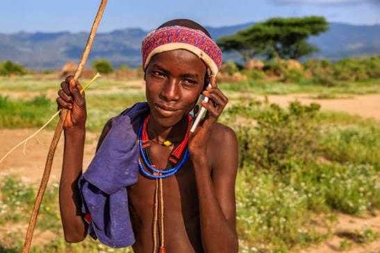 Rural resident using a smartphone for mobile internet access